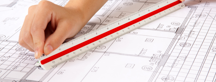 scale ruler on blueprints